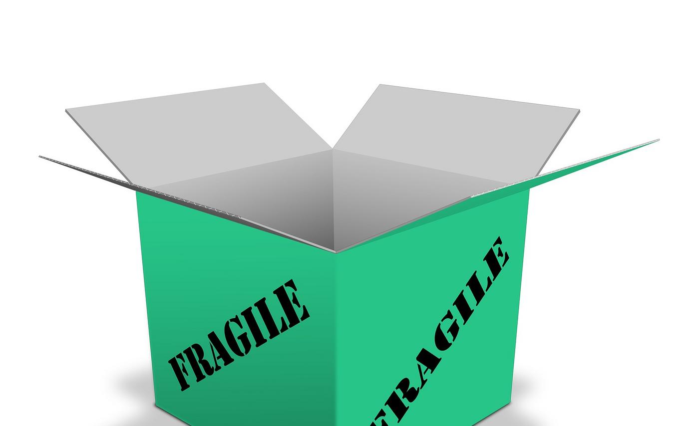 Open cardboard box with "Fragile" written on it